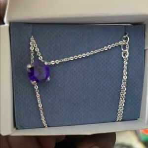 Elegant Silver Bracelet with Purple Gemstone